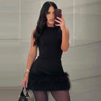 Schwarzes Mini Kleid mit Federn