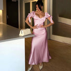 Rosa Satin Kleid mit Puffärmeln