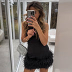 Schwarzes Mini Kleid mit Federn
